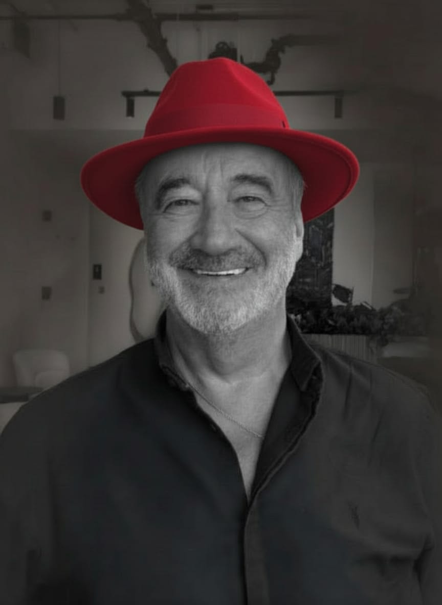 John Davy wearing his signature red hat